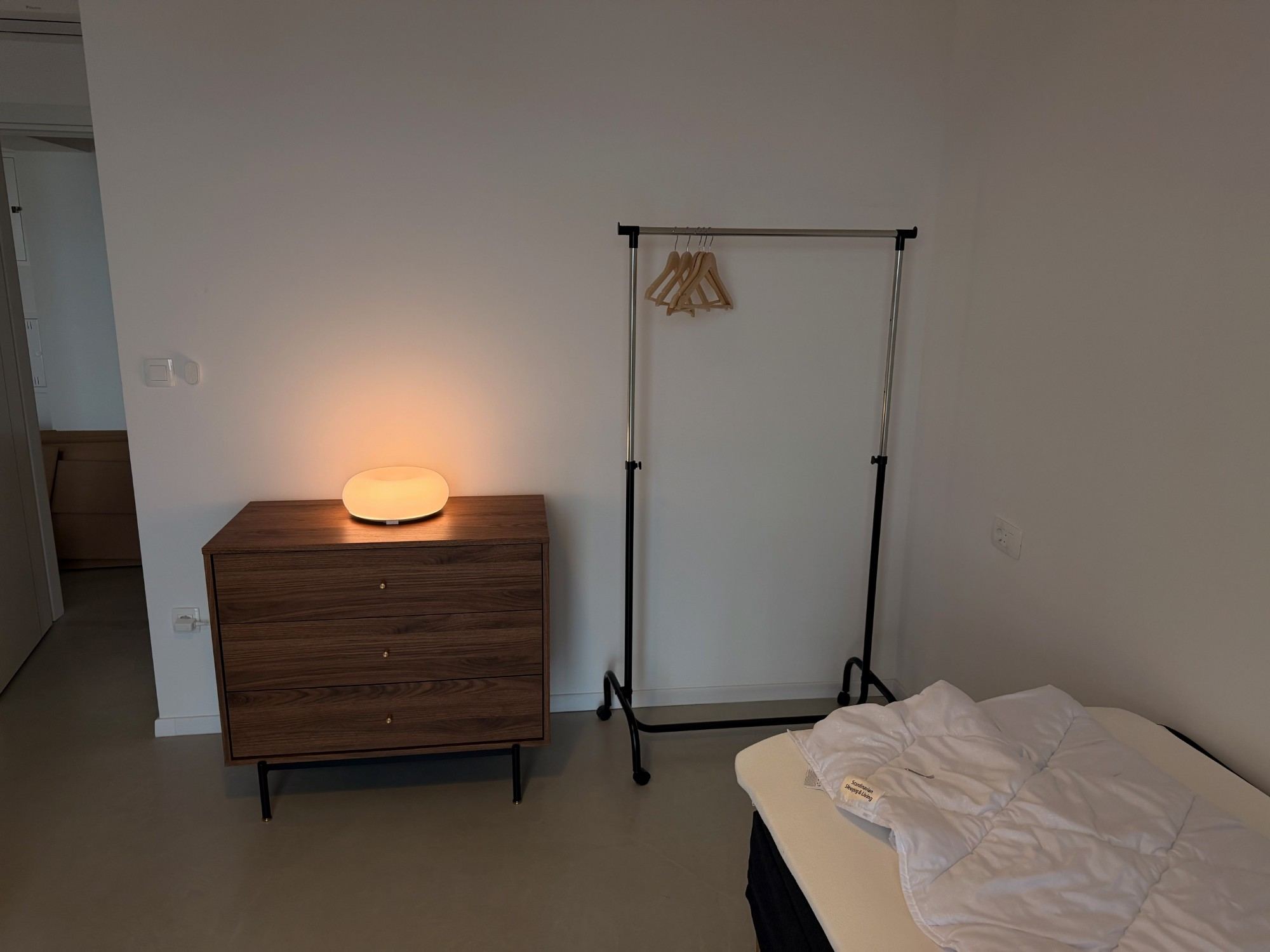 Bedroom dresser and clothing rail
